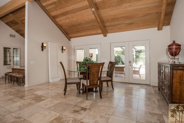2 Boothill Circle Rancho Mirage, CA 92270 - Photo 11 of 42 a view of a dining room with furniture and a chandelier