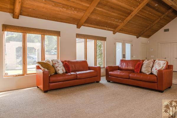 2 Boothill Circle Rancho Mirage, CA 92270 - Photo 20 of 42 a living room with furniture and a large window