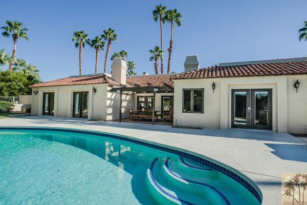 2 Boothill Circle Rancho Mirage, CA 92270 - Photo 23 of 42 a front view of a house with garden