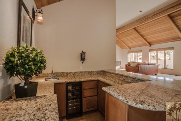 2 Boothill Circle Rancho Mirage, CA 92270 - Photo 27 of 42 a kitchen with a sink and a stove