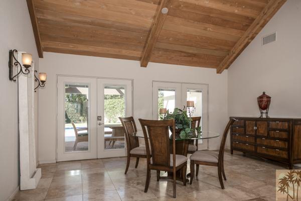 2 Boothill Circle Rancho Mirage, CA 92270 - Photo 28 of 42 a view of a dining room with furniture and window