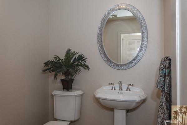 2 Boothill Circle Rancho Mirage, CA 92270 - Photo 38 of 42 a bathroom with a sink and a mirror