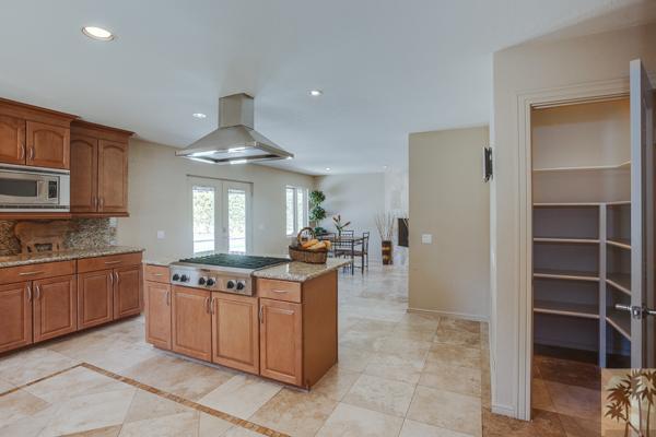 2 Boothill Circle Rancho Mirage, CA 92270 - Photo 6 of 42 a kitchen with stainless steel appliances granite countertop a stove and a sink