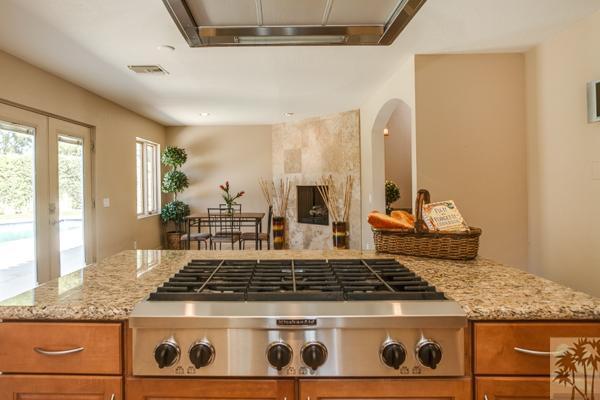 2 Boothill Circle Rancho Mirage, CA 92270 - Photo 7 of 42 a stove top oven sitting inside of a kitchen