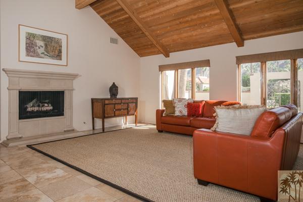2 Boothill Circle Rancho Mirage, CA 92270 - Photo 10 of 42 a living room with furniture and a fireplace