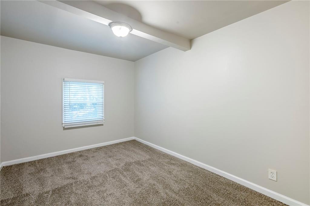 3735 Boulder Park Drive Southwest Atlanta, GA 30331 - Photo 13 of 29 an empty room with a window