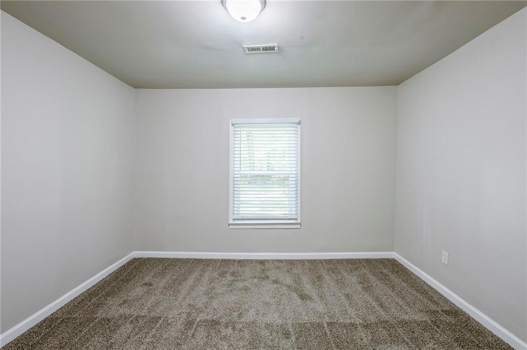 3735 Boulder Park Drive Southwest Atlanta, GA 30331 - Photo 15 of 29 an empty room with a window