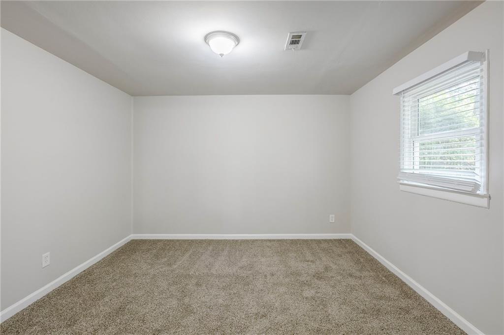 3735 Boulder Park Drive Southwest Atlanta, GA 30331 - Photo 17 of 29 an empty room with a window