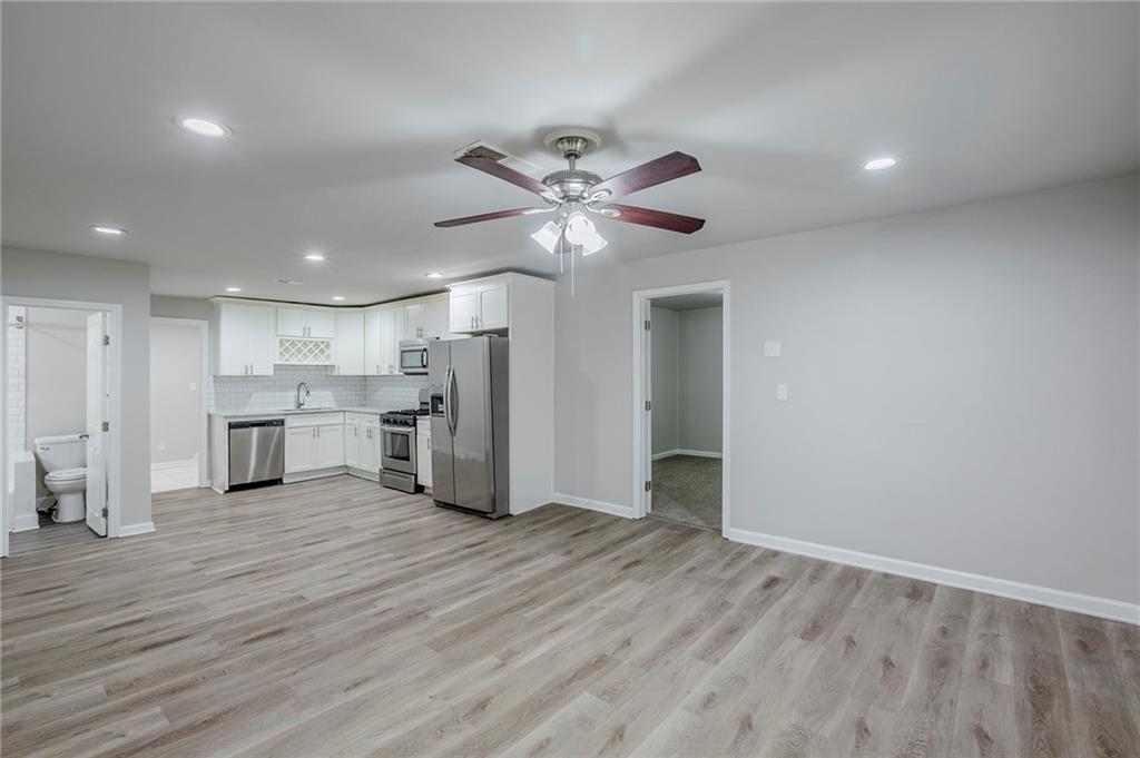 3735 Boulder Park Drive Southwest Atlanta, GA 30331 - Photo 7 of 29 a view of an empty room with a kitchen