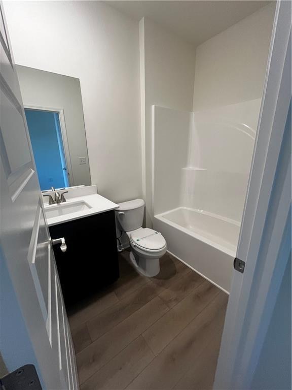 118 Lavender Circle Calhoun, GA 30701 - Photo 15 of 31 a bathroom with a double vanity sink toilet and shower