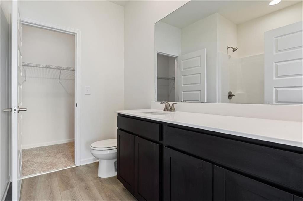 118 Lavender Circle Calhoun, GA 30701 - Photo 21 of 31 a bathroom with a sink and a toilet