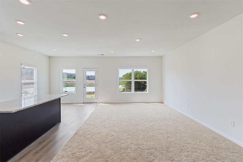 118 Lavender Circle Calhoun, GA 30701 - Photo 8 of 31 an empty room with windows and entrance