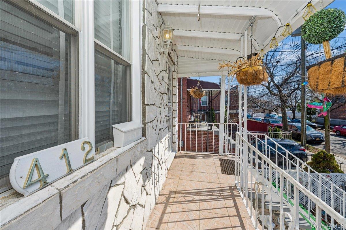 412 Calhoun Avenue Bronx, NY 10465 - Photo 3 of 26 a view of a house with a large window
