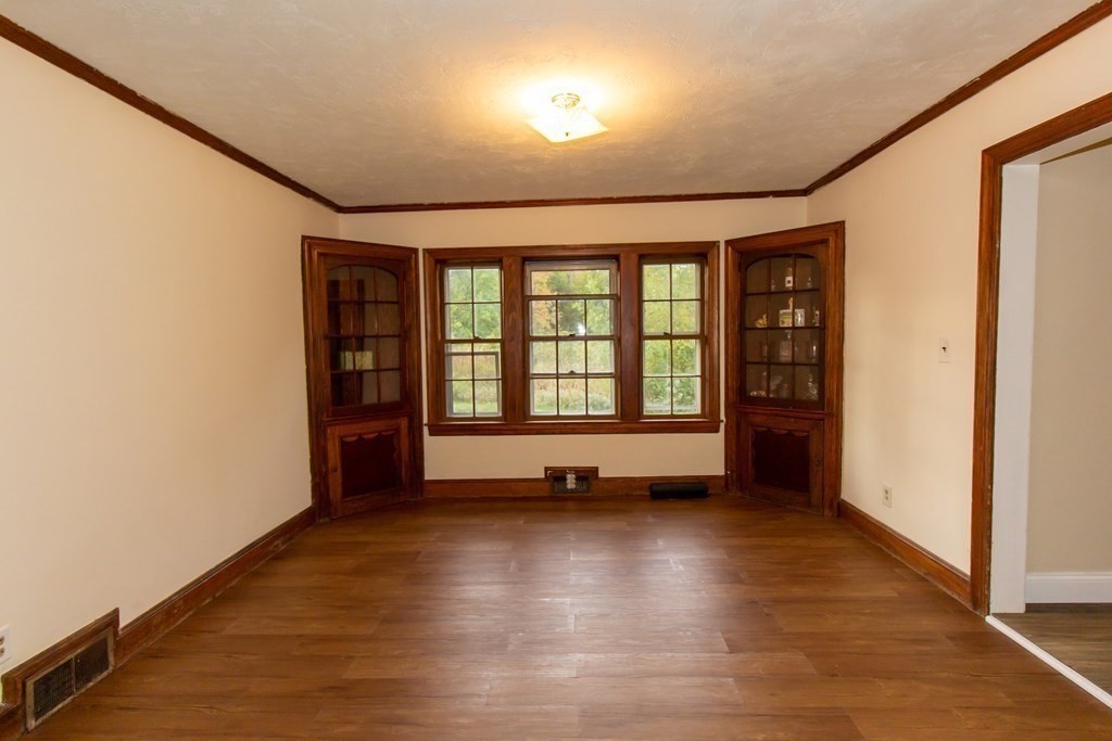 28 Flagg Road Hubbardston, MA 01452 - Photo 11 of 40 an empty room with windows