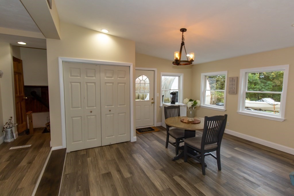 28 Flagg Road Hubbardston, MA 01452 - Photo 12 of 40 a view of a dining room with furniture window and wooden floor