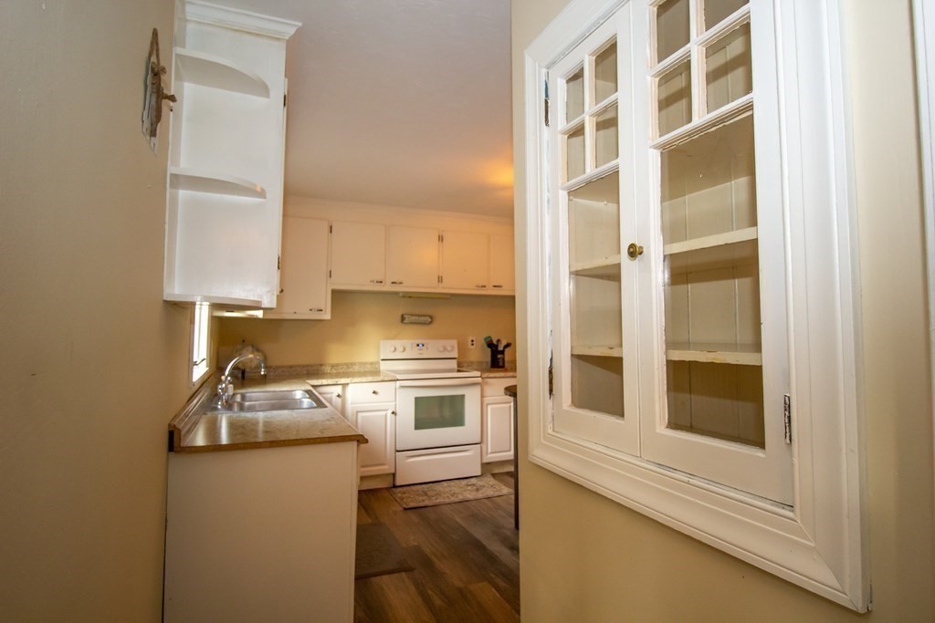 28 Flagg Road Hubbardston, MA 01452 - Photo 16 of 40 a kitchen with stainless steel appliances a stove and a refrigerator