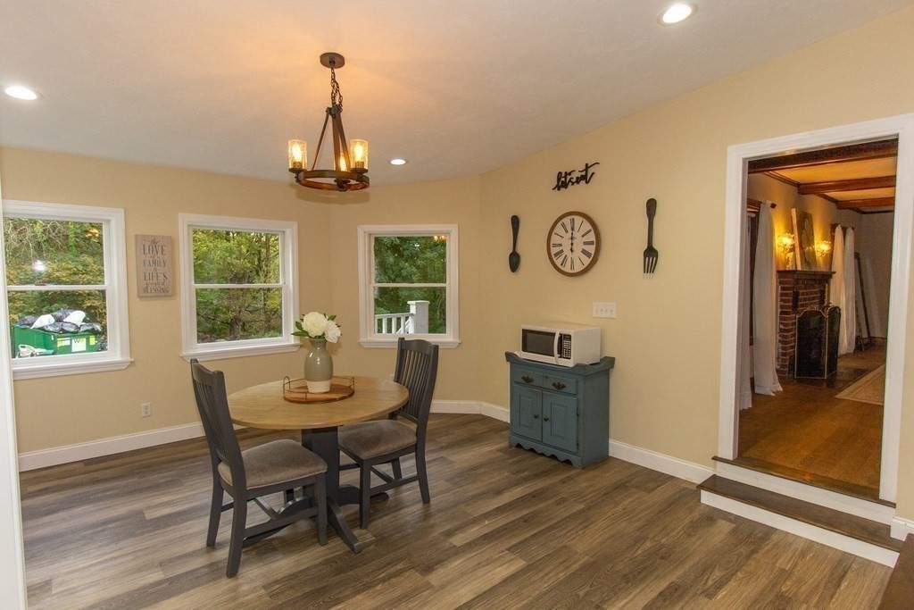 28 Flagg Road Hubbardston, MA 01452 - Photo 18 of 40 a view of a dining room with furniture window and wooden floor