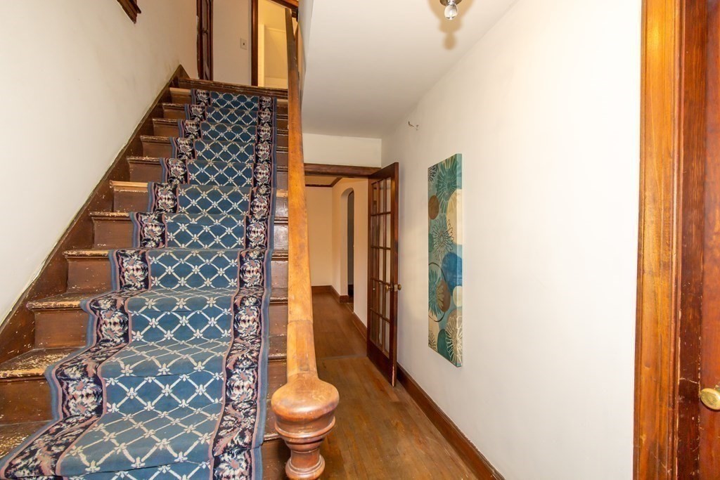 28 Flagg Road Hubbardston, MA 01452 - Photo 19 of 40 a bathroom with a toilet and a shower curtain