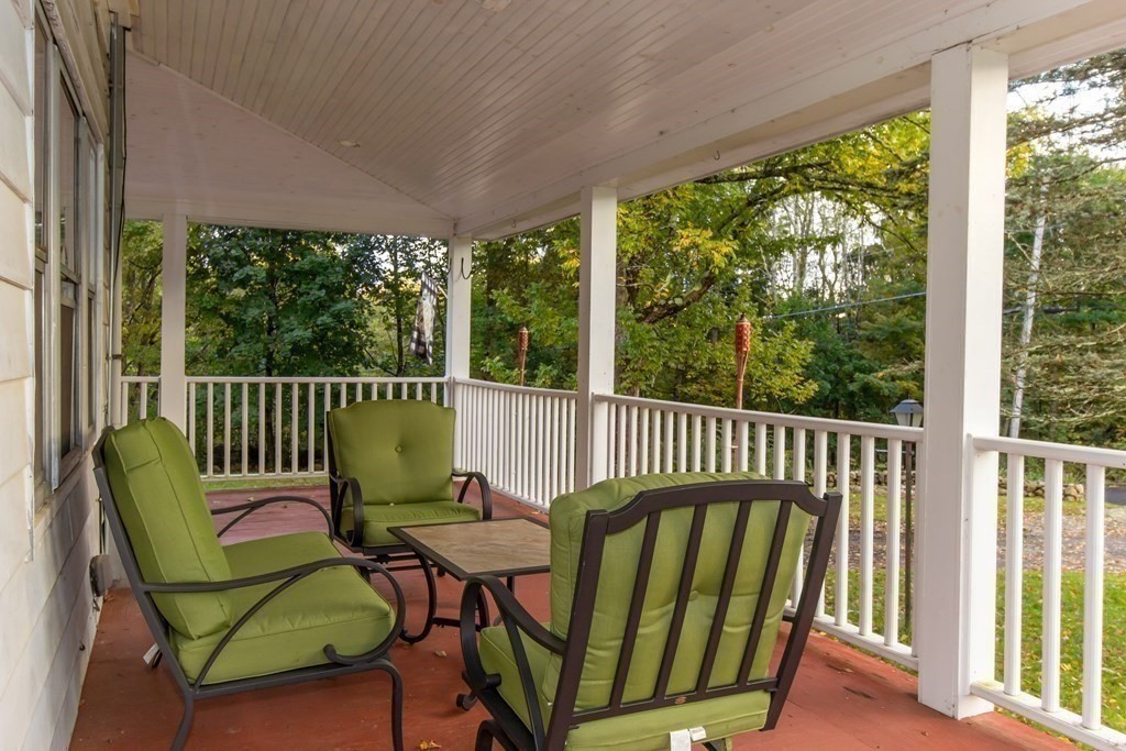 28 Flagg Road Hubbardston, MA 01452 - Photo 32 of 40 a view of a two chairs in the balcony