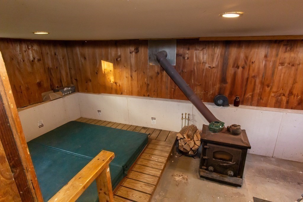 28 Flagg Road Hubbardston, MA 01452 - Photo 35 of 40 a view of a room with furniture and a window