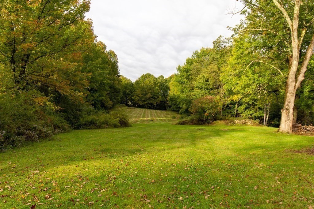 28 Flagg Road Hubbardston, MA 01452 - Photo 37 of 40 a view of yard with swimming pool and green space