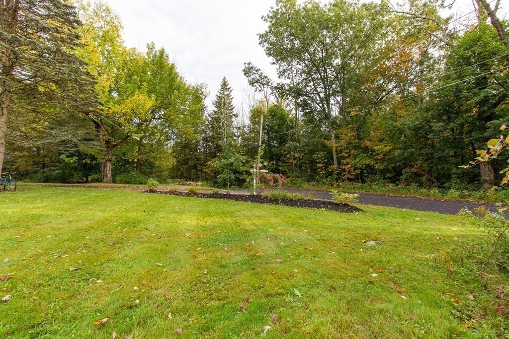28 Flagg Road Hubbardston, MA 01452 - Photo 38 of 40 a view of a yard with a trees