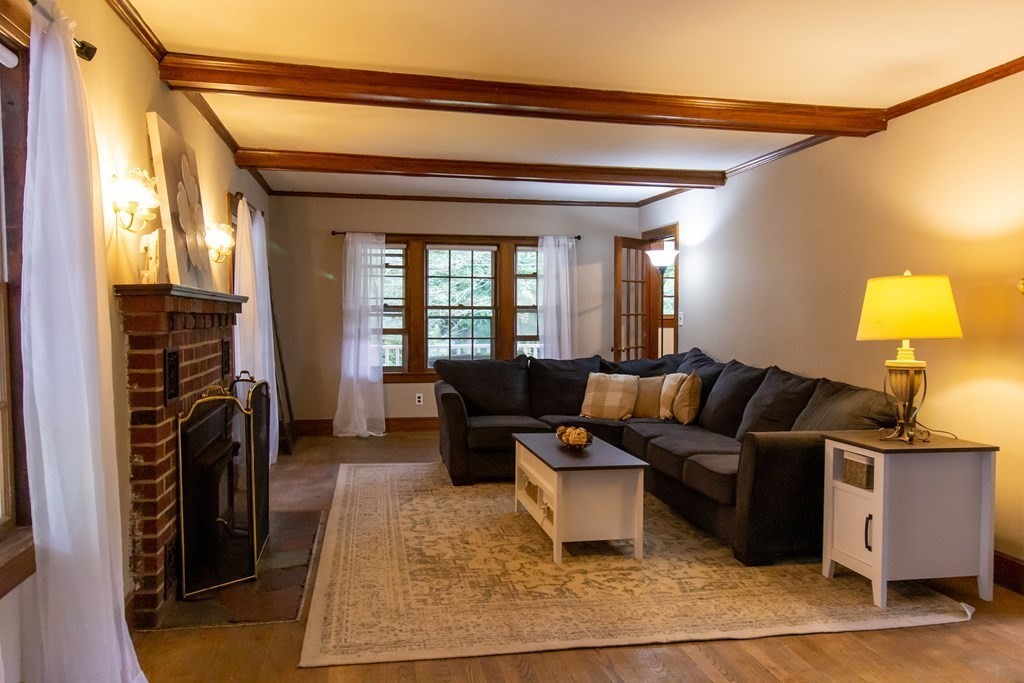 28 Flagg Road Hubbardston, MA 01452 - Photo 5 of 40 a living room with furniture and a fireplace