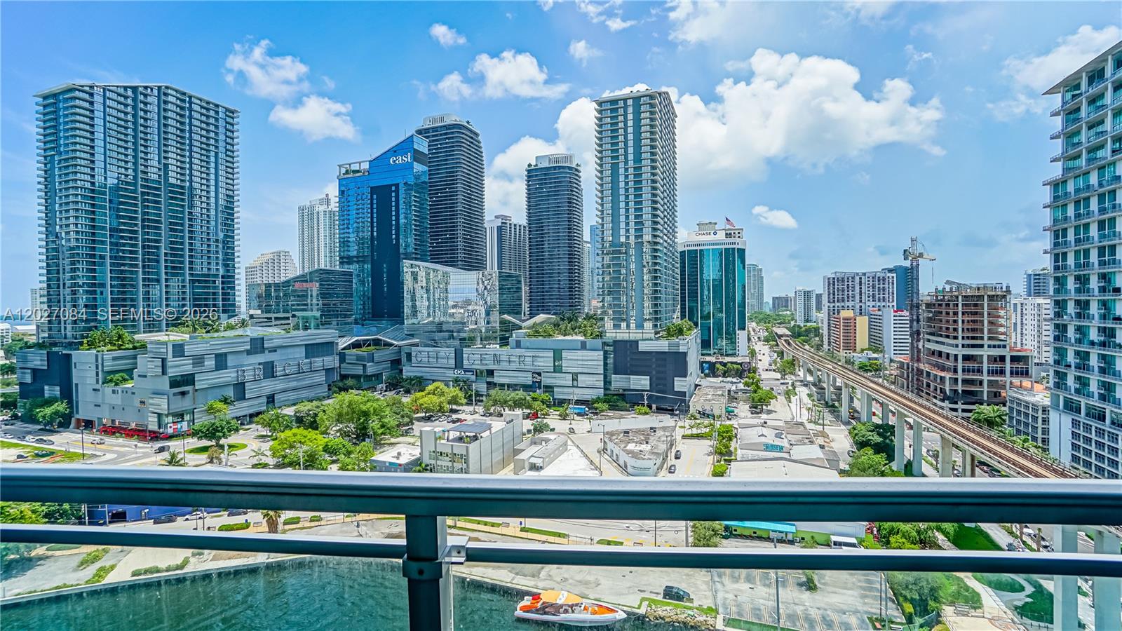 92 Southwest 3rd Street, Unit 1803 Miami, FL 33130 - Photo 19 of 29 a view of a city from a balcony