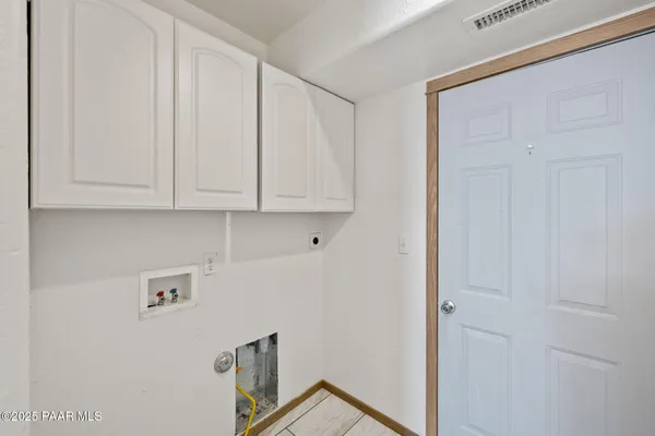 a view of a utility room with washer and dryer