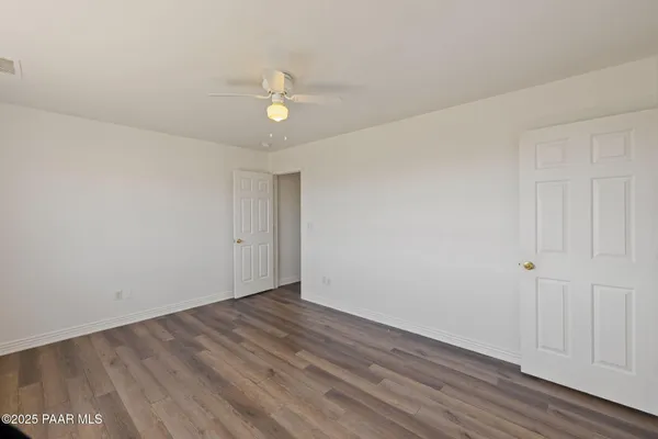 a view of an empty walk in closet