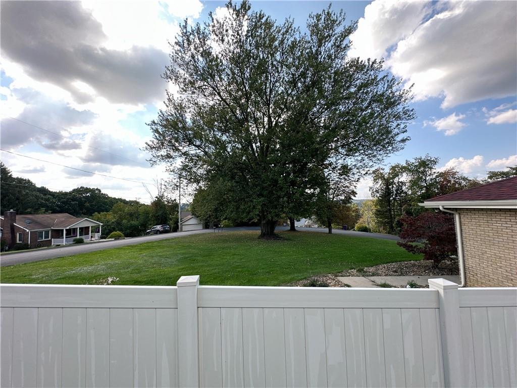 401 Clements Road Pittsburgh, PA 15239 - Photo 4 of 24 a view of a house with a yard