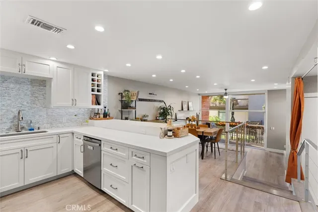 a view of a kitchen and dining room