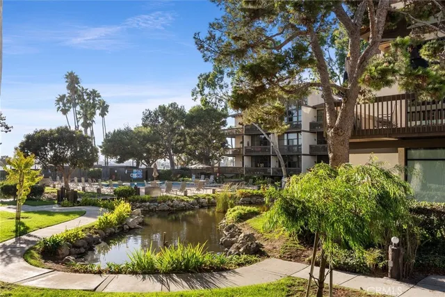 a view of a swimming pool with a patio