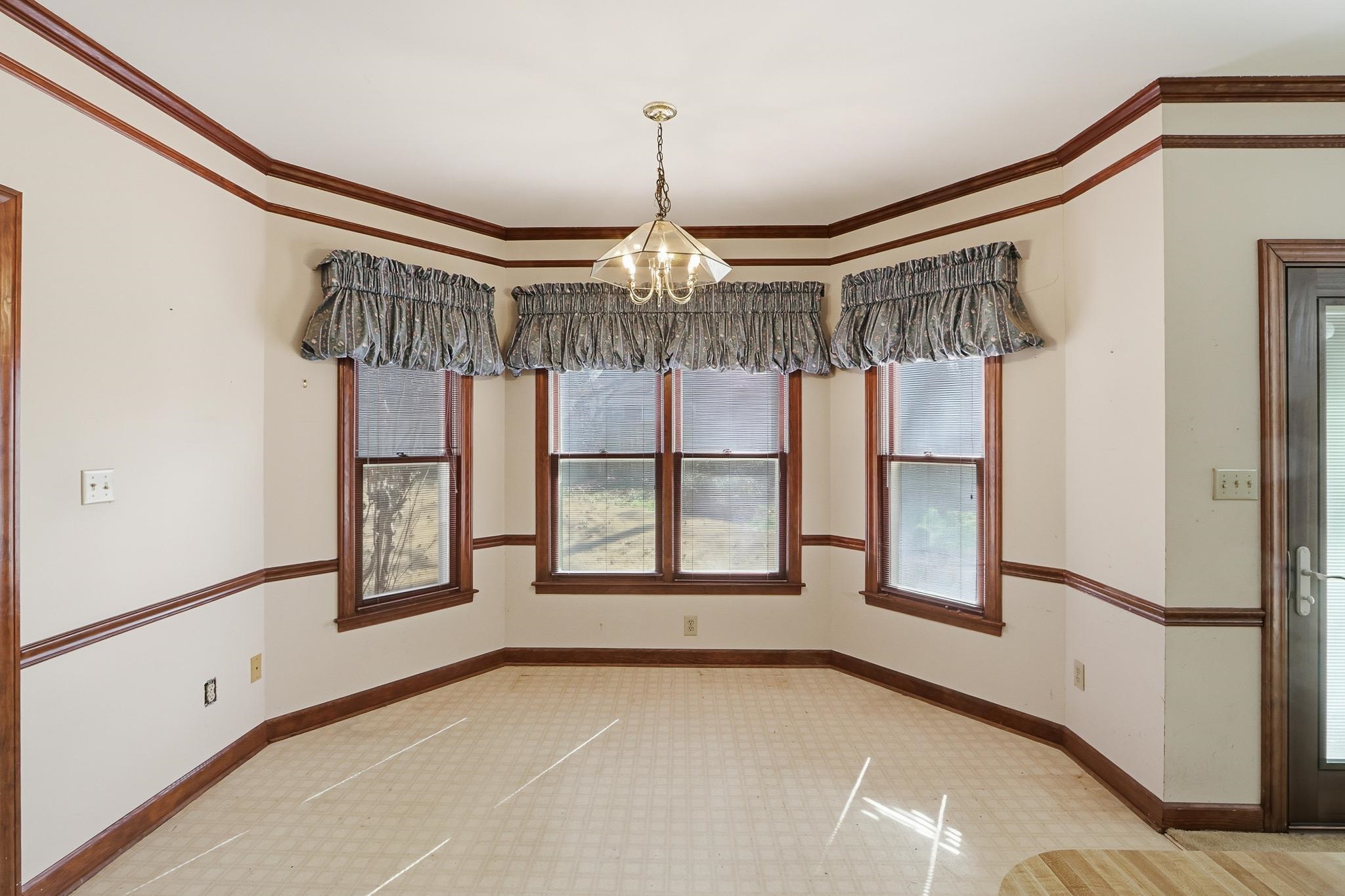 2670 Stout Rd Cove Memphis, TN 38119 - Photo 16 of 37 a view of a room with window and chandelier