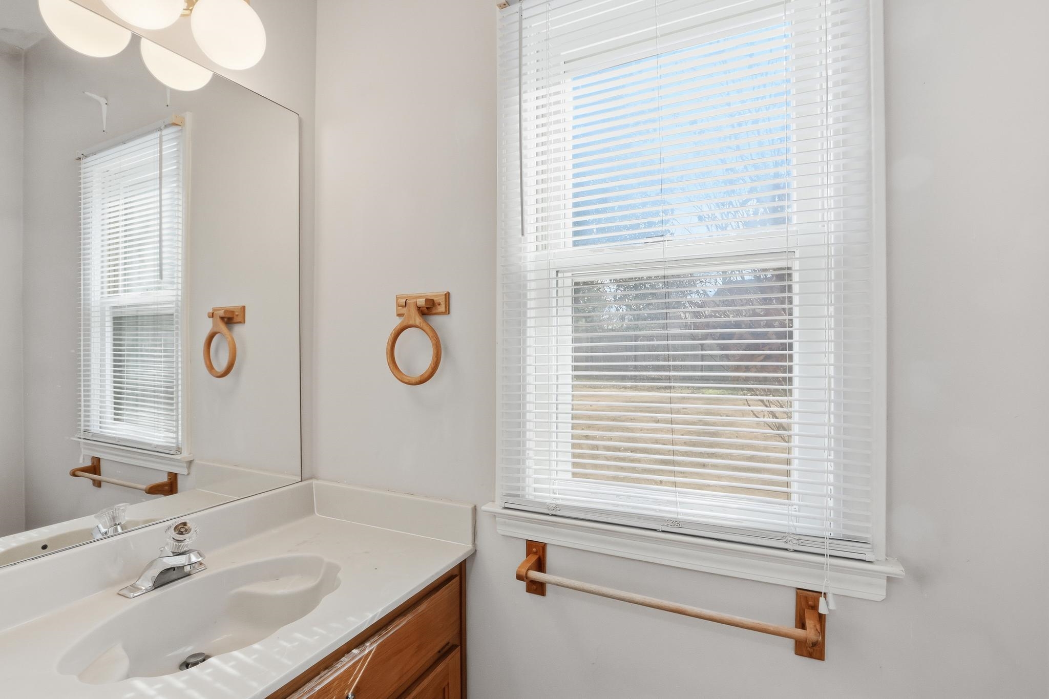 2670 Stout Rd Cove Memphis, TN 38119 - Photo 19 of 37 Half bath with vanity and healthy amount of natural light