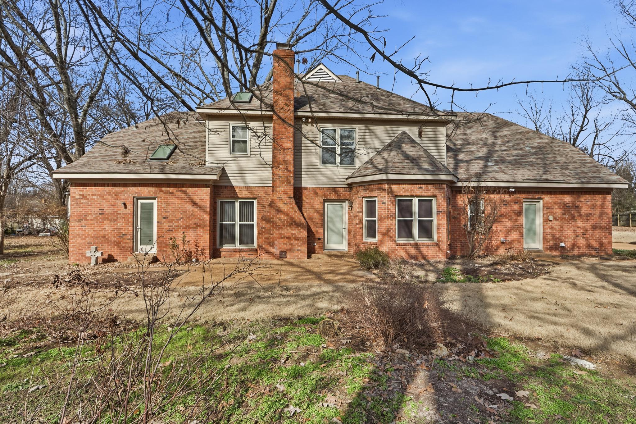 2670 Stout Rd Cove Memphis, TN 38119 - Photo 35 of 37 front view of a house with a dry yard
