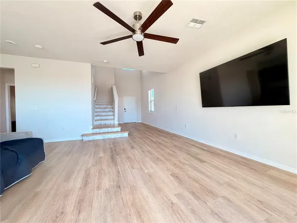 a view of a livingroom with a flat screen tv