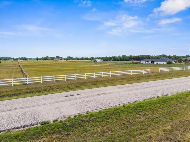 a view of an ocean and city