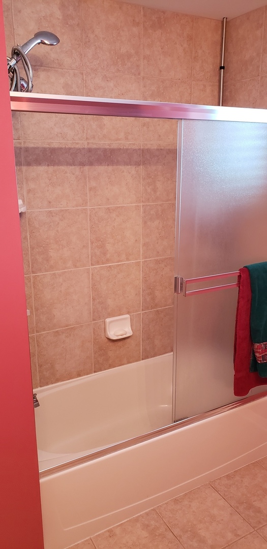511 Prestwick Lane, Unit 501 Wheeling, IL 60090 - Photo 11 of 21 a bathroom with a shower