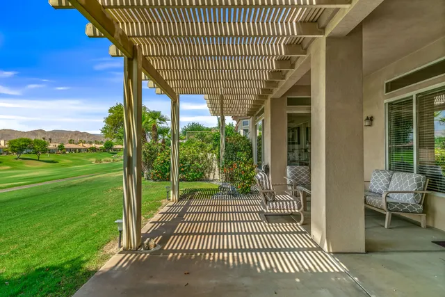 a view of a deck with a yard