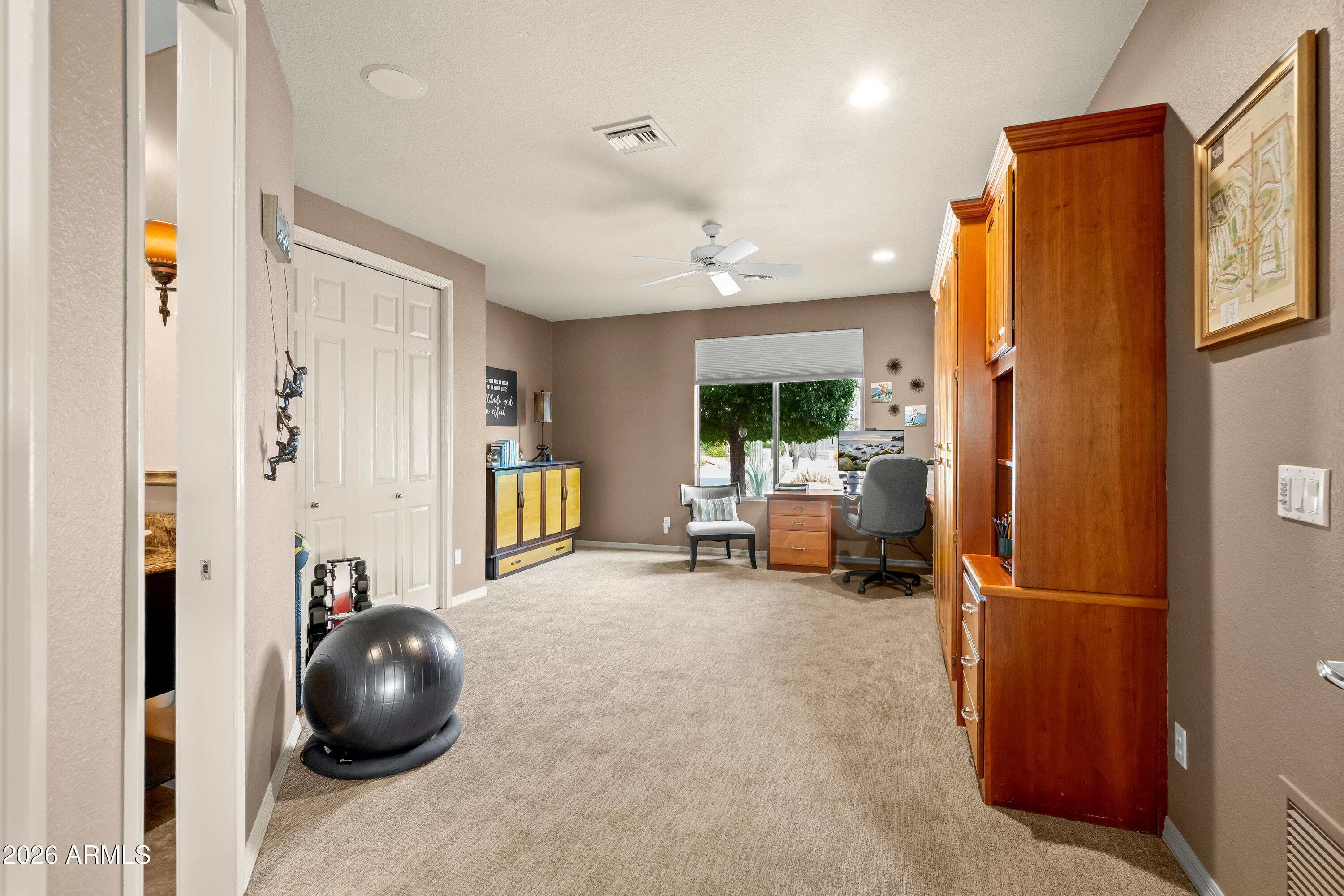 18513 East Agua Verde Drive Rio Verde, AZ 85263 - Photo 30 of 42 a view of a livingroom with furniture and a window