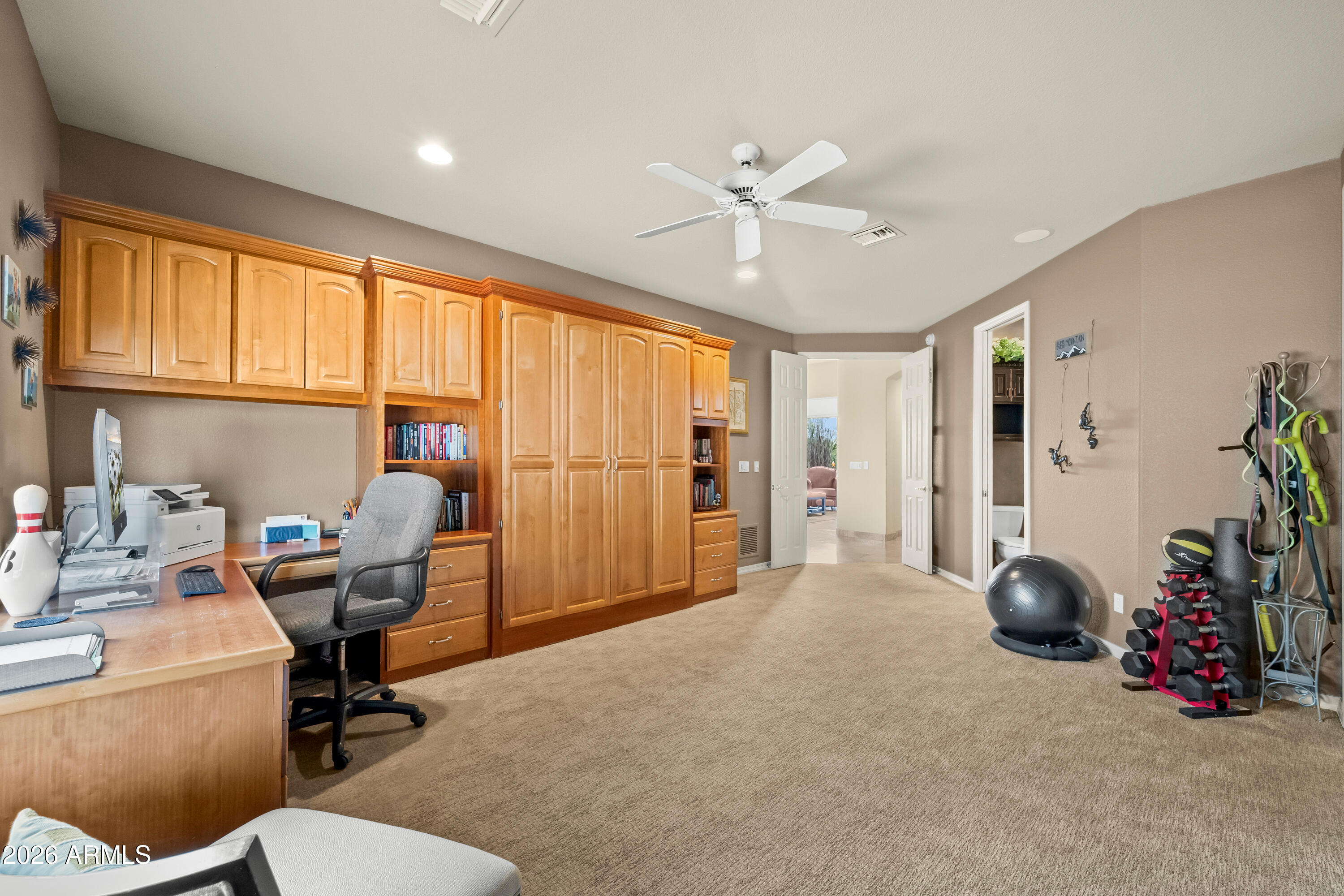 18513 East Agua Verde Drive Rio Verde, AZ 85263 - Photo 31 of 42 a view of a livingroom with workspace