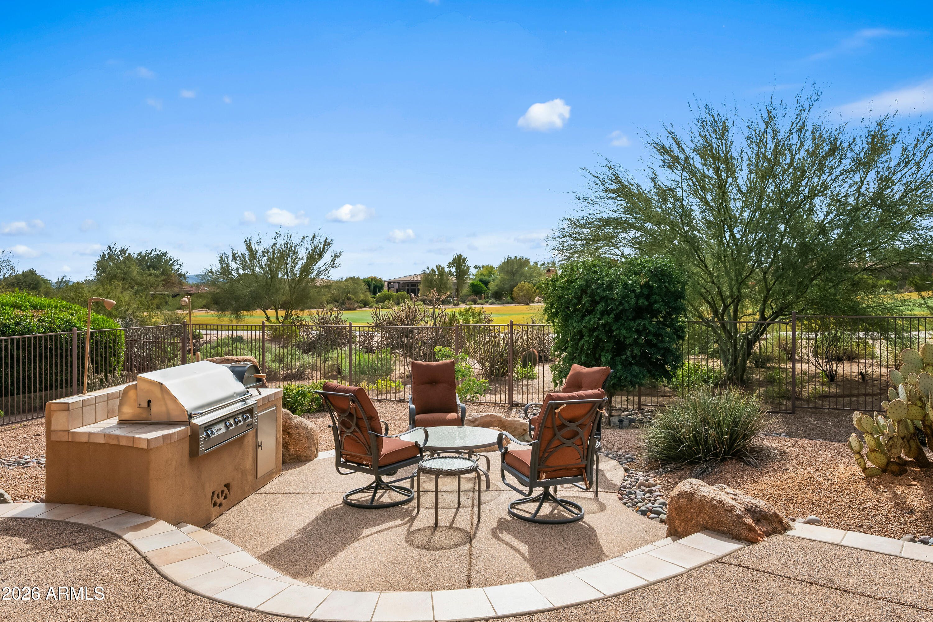 18513 East Agua Verde Drive Rio Verde, AZ 85263 - Photo 35 of 42 a view of a roof deck with couches and wooden floor