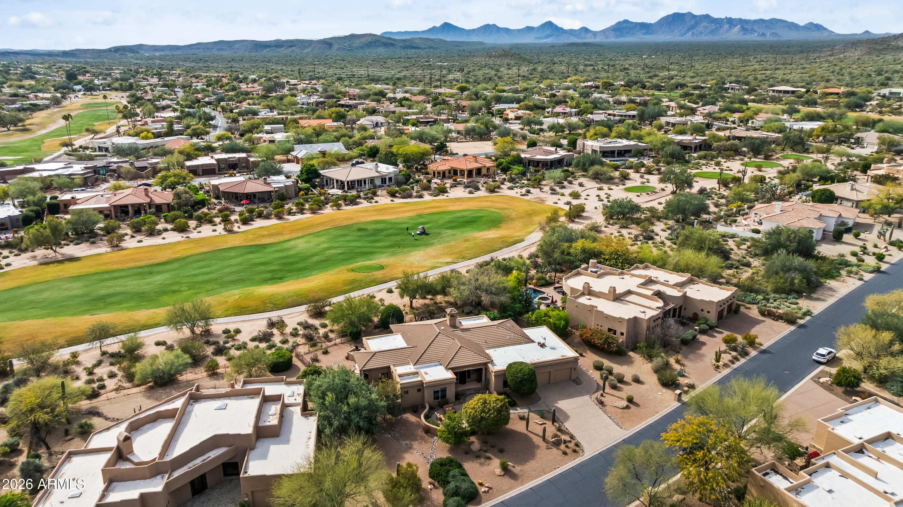 18513 East Agua Verde Drive Rio Verde, AZ 85263 - Photo 4 of 42 an aerial view of residential houses with outdoor space