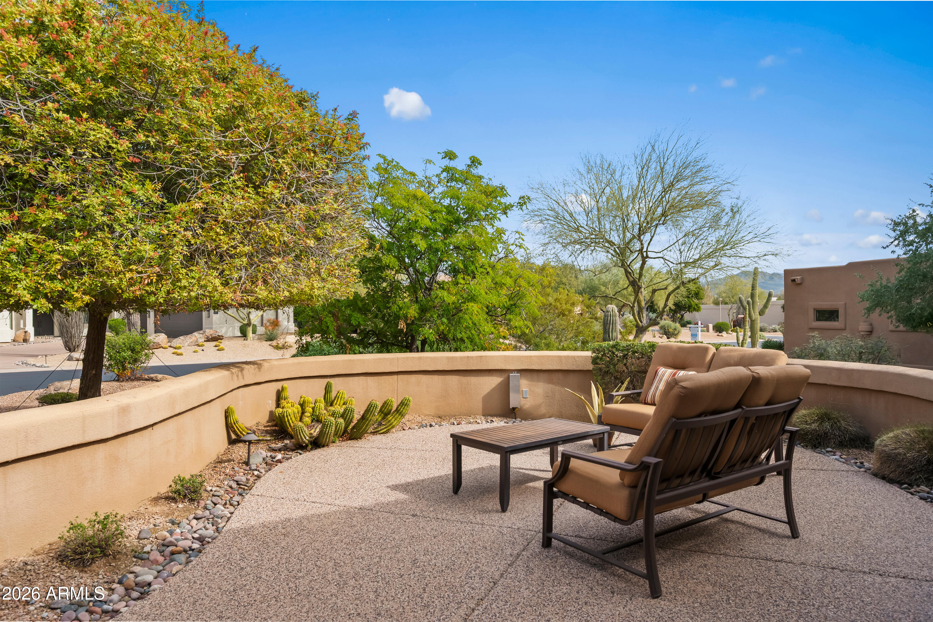 18513 East Agua Verde Drive Rio Verde, AZ 85263 - Photo 7 of 42 a swimming pool with outdoor seating and yard