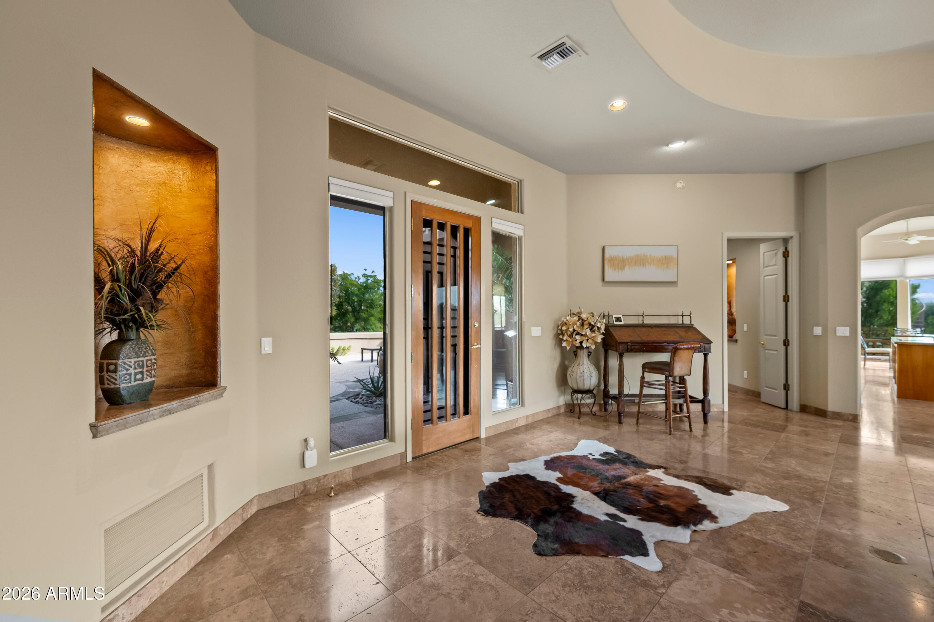 18513 East Agua Verde Drive Rio Verde, AZ 85263 - Photo 9 of 42 a living room with furniture and a piano