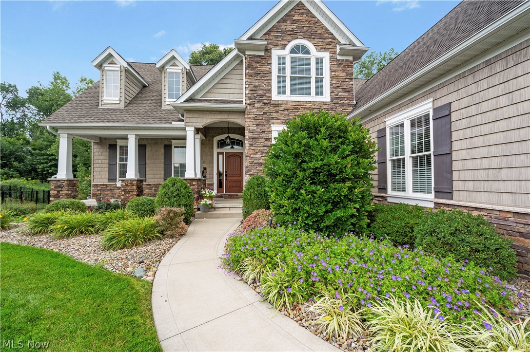 View of front of property with covered porch