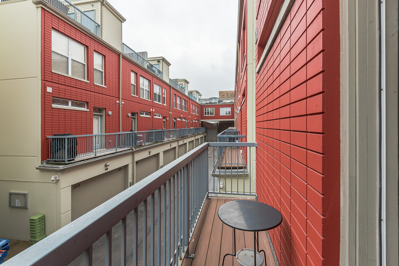 16 South Aberdeen Street, Unit 9 Chicago, IL 60607 - Photo 5 of 24 a balcony view with an outdoor seating