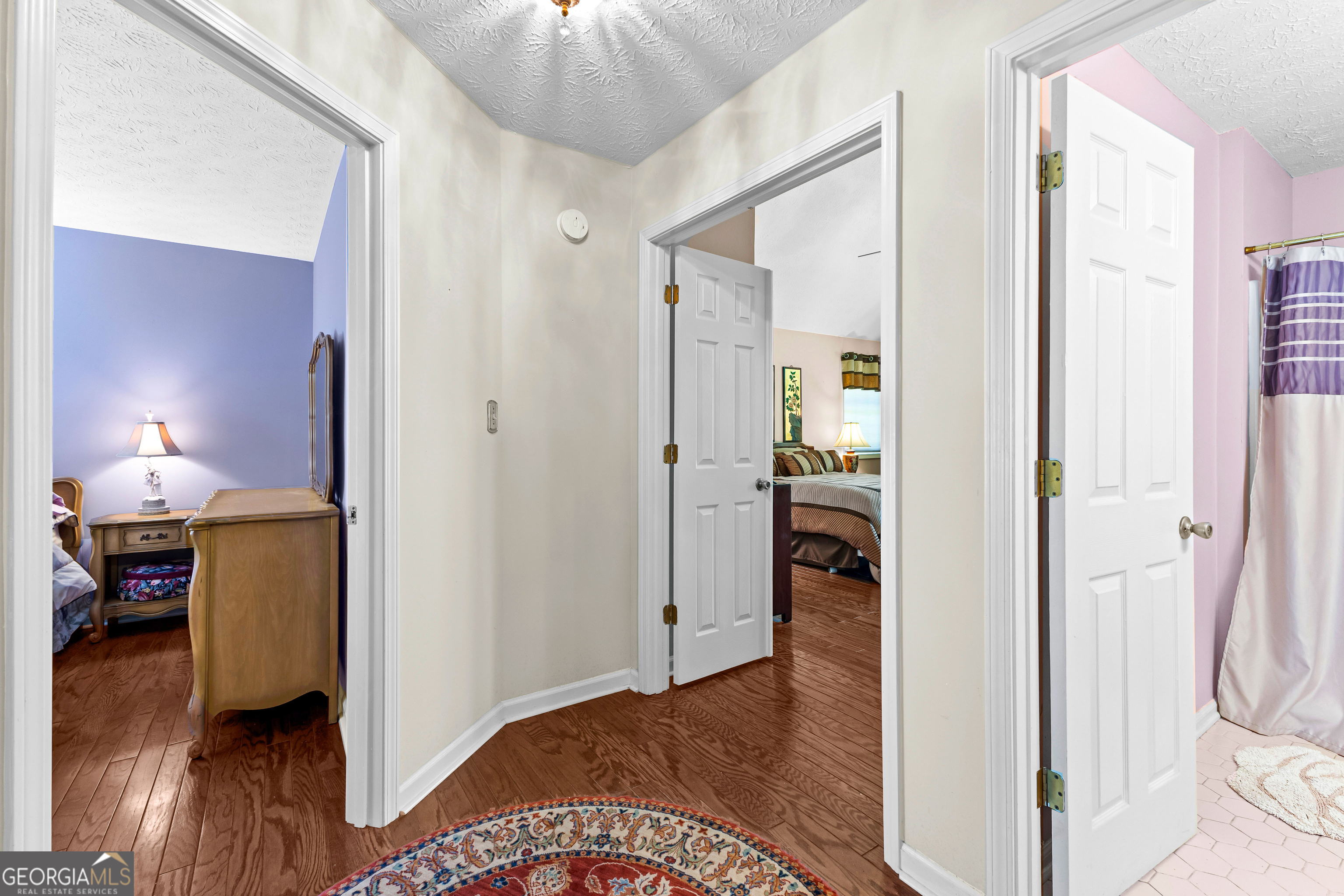 65 Pointe View Court Jackson, GA 30233 - Photo 27 of 39 a view of a bedroom from a hallway