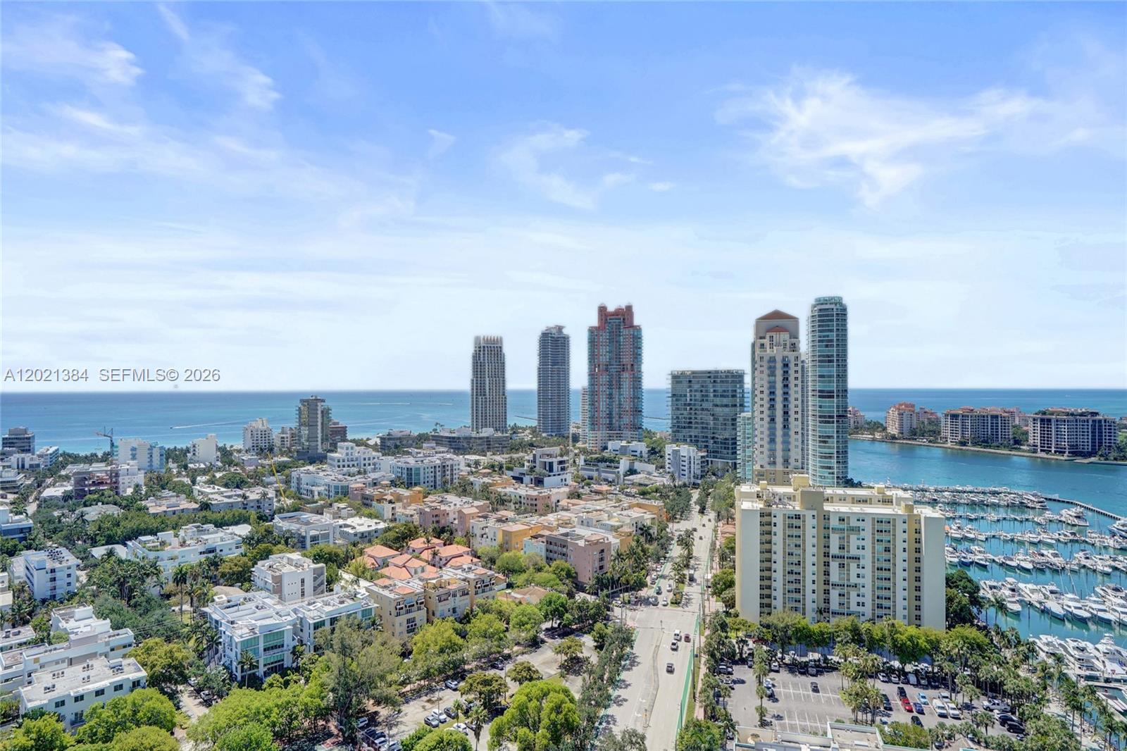 400 Alton Road, Unit PH11 Miami Beach, FL 33139 - Photo 23 of 49 a view of a city with tall buildings in the background